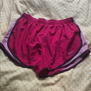 Pink Nike athletic shorts